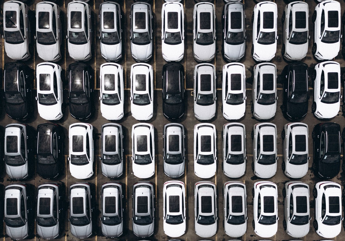 us auto factory floor with machinery and workers