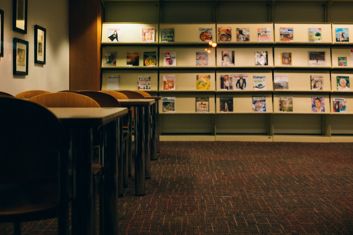 Time Inc. logo and magazine rack