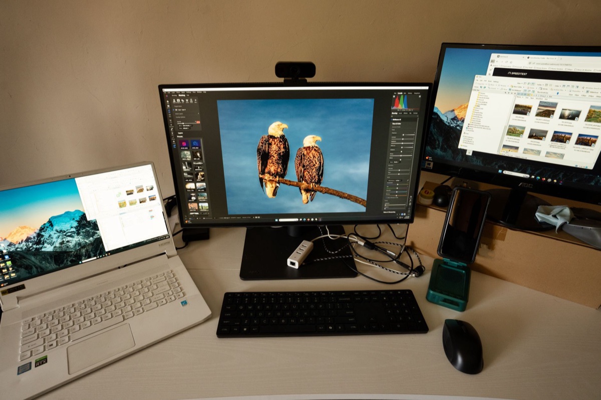 laptop and monitor setup in a modern office