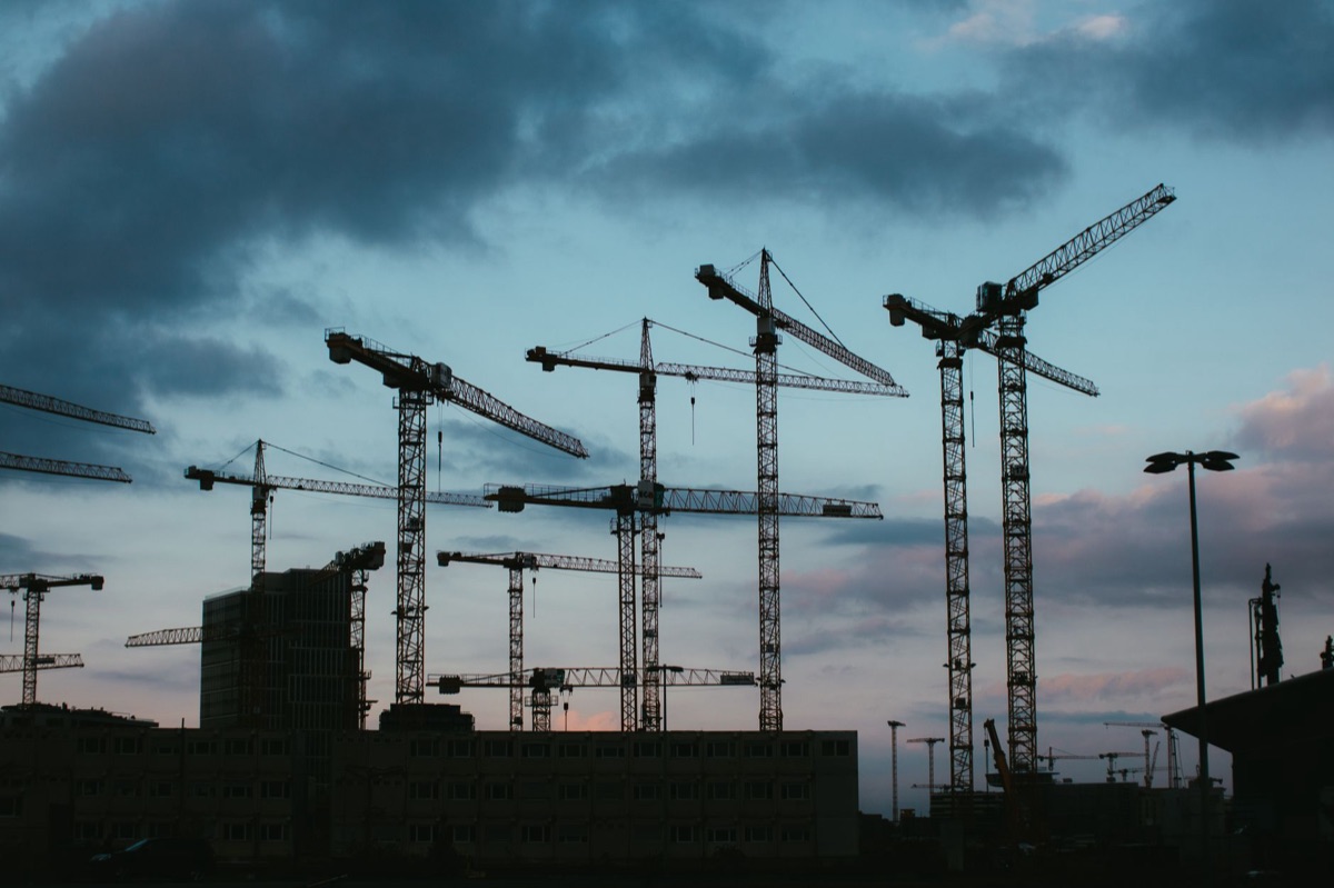 Construction site with cranes in a U.S. industrial area