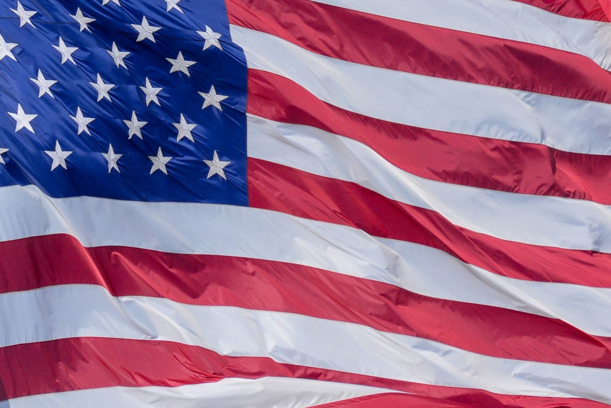 The American flag waving in the wind